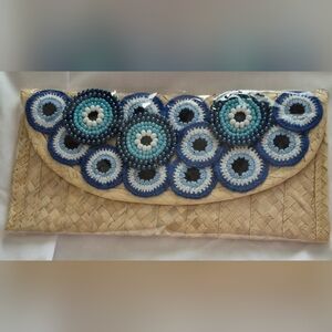 Evil eyes straw clutch bag from Brazil